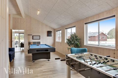 Aktivitätsraum im Luxusferienhaus Nr. 408 mit 7 Schlafzimmern und Platz für 18 Gäste.