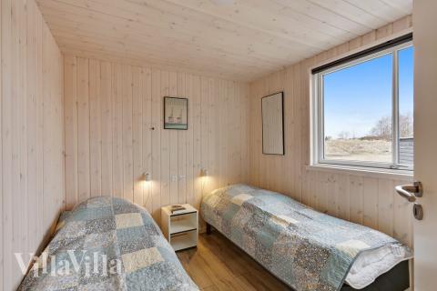 Eines der 7 Schlafzimmer im Luxusferienhaus Nr. 408