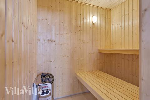 Genießen Sie die heiße Sauna im Luxusferienhaus Nr. 408 für 18 Personen