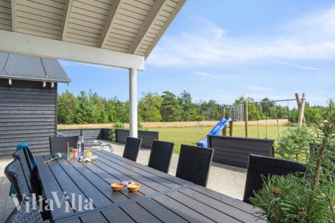 Genießen Sie einen Grillabend auf der Terrasse des Luxusferienhauses Nr. 408 in Nordjütland