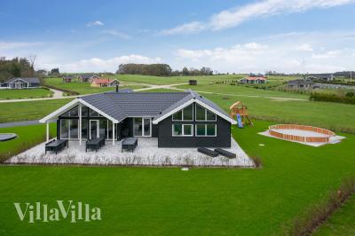 Dieses schöne Poolhaus Nr. 392 mit Platz für 18 Personen liegt in Fünen und seine Inseln