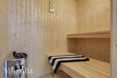 Genießen Sie die heiße Sauna im Luxusferienhaus Nr. 392 für 18 Personen