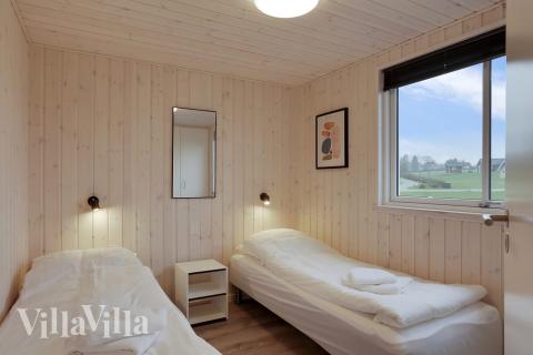 Eines der 7 Schlafzimmer im Luxusferienhaus Nr. 392