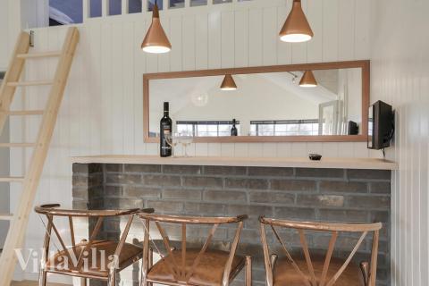 Das Ferienhaus 415 ist mit eigener Bar ausgestattet