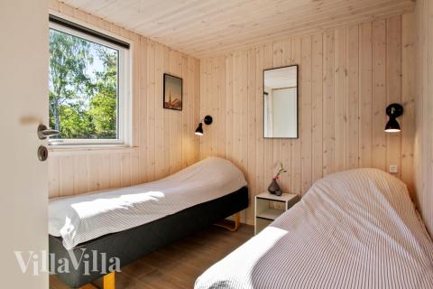 Eines der 8 Schlafzimmer im Luxusferienhaus Nr. 410