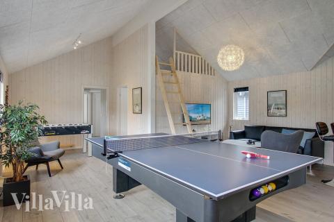 Aktivitätsraum im Luxusferienhaus Nr. 409 mit 7 Schlafzimmern und Platz für 18 Gäste.