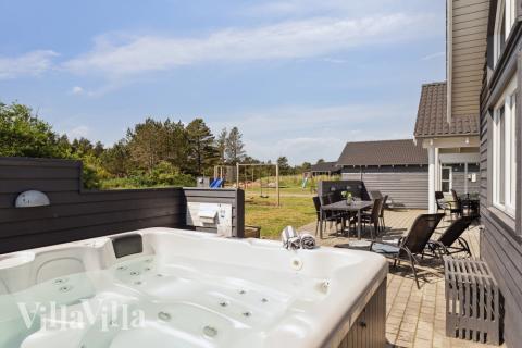 Das Luxusferienhaus Nr. 409 bietet u. a. einen tollen Whirlpool