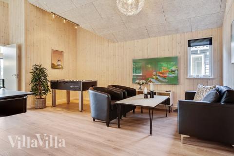 Das Luxusferienhaus 416 für 16 Personen hat einen großen Aktivitätsraum mit u. a. Billard und Darts