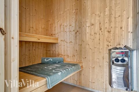 Genießen Sie die heiße Sauna im Luxusferienhaus Nr. 416 für 16 Personen