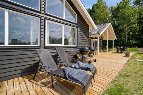 Das Luxusferienhaus Nr. 416 hat eine tolle Terrasse, die mit hochwertigen Gartenmöbeln für 16 Personen ausgestattet ist.