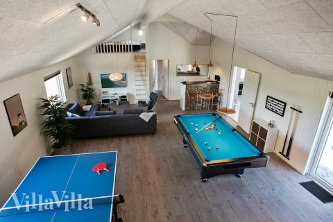 Neben den vielen schönen Stunden, die man im Poolbereich des Hauses verbringen kann, bietet das Luxusferienhaus 403 auch Spielevergnügen bei Billard/Tischtennis und Darts