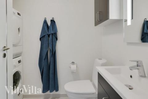 Eines der Badezimmer im Luxusferienhaus Nr. 403