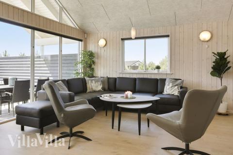 Aufenthaltsraum mit Platz für 20 im Luxusferienhaus Nr. 413.