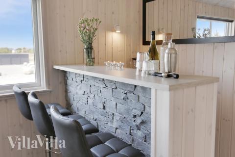 Das Ferienhaus 413 ist mit eigener Bar ausgestattet