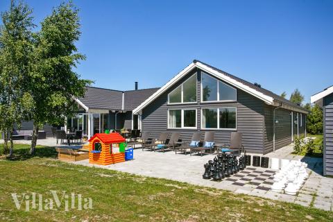 Dieses schöne Poolhaus Nr. 413 mit Platz für 20 Personen liegt in Lolland/Falster/Mön