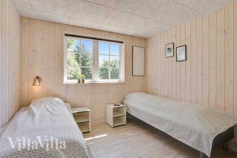 Eines der 9 Schlafzimmer im Luxusferienhaus Nr. 419