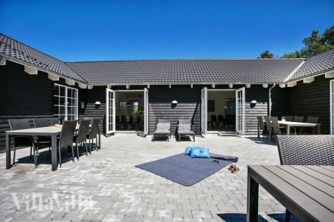 Das Luxusferienhaus Nr. 419 hat eine tolle Terrasse, die mit hochwertigen Gartenmöbeln für 24 Personen ausgestattet ist.