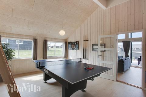 Das Luxusferienhaus 418 für 14 Personen hat einen großen Aktivitätsraum mit u. a. Billard und Darts