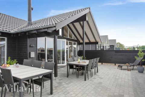 Das Luxusferienhaus Nr. 418 hat eine tolle Terrasse, die mit hochwertigen Gartenmöbeln für 14 Personen ausgestattet ist.