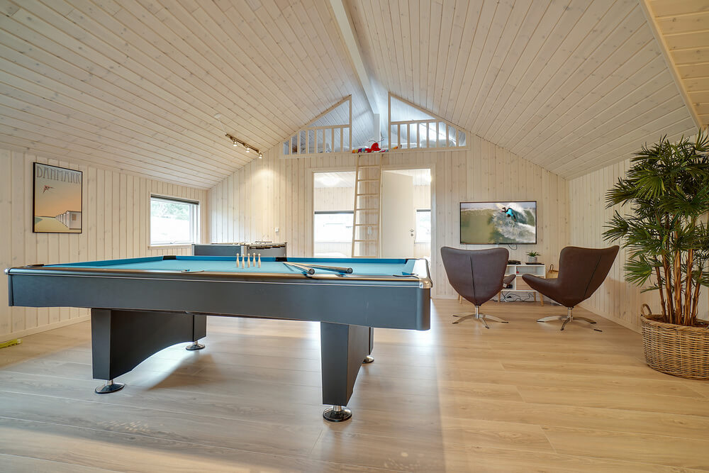 Neben den vielen schönen Stunden, die man im Poolbereich des Hauses verbringen kann, bietet das Luxusferienhaus 417 auch Spielevergnügen bei Billard/Tischtennis und Darts