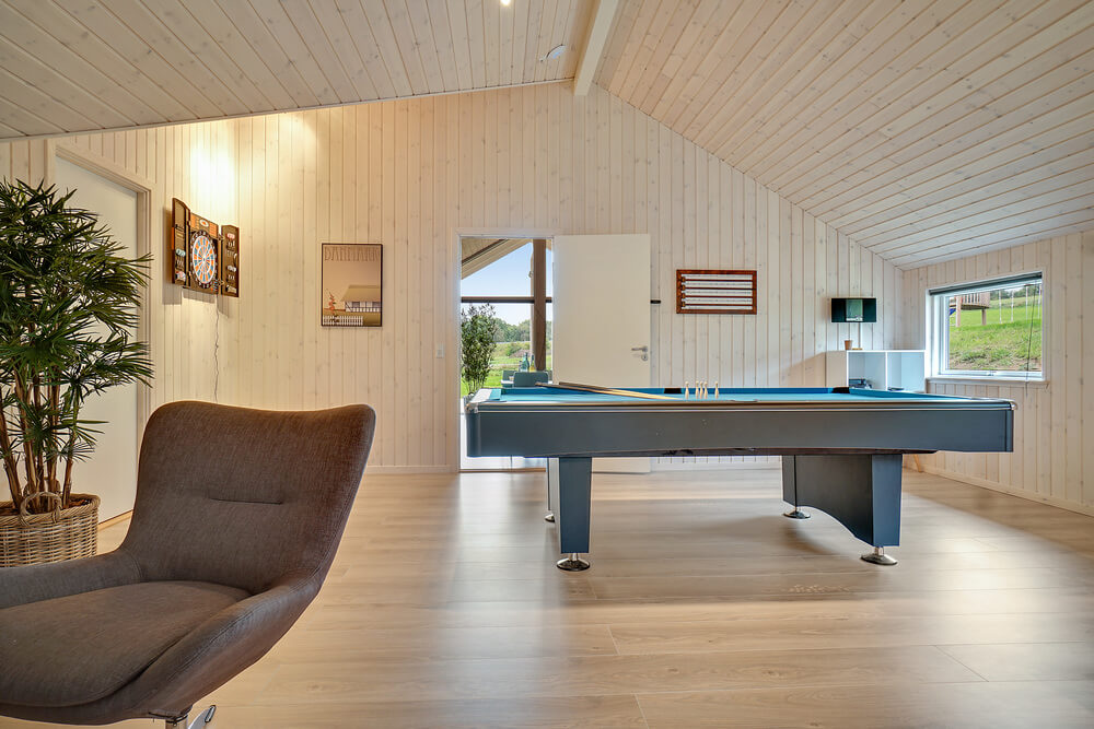 Aktivitätsraum im Luxusferienhaus Nr. 417 mit 5 Schlafzimmern und Platz für 14 Gäste.