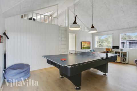 Neben den vielen schönen Stunden, die man im Poolbereich des Hauses verbringen kann, bietet das Luxusferienhaus 411 auch Spielevergnügen bei Billard/Tischtennis und Darts