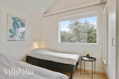 Eines der 5 Schlafzimmer im Luxusferienhaus Nr. 411