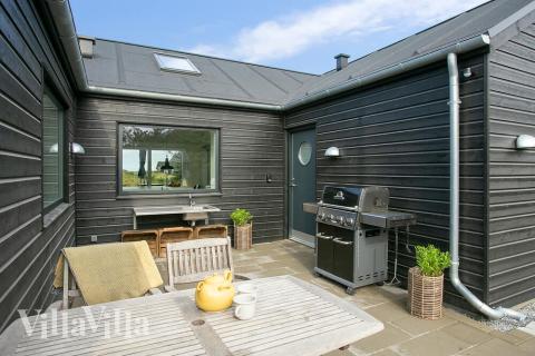 Das Luxusferienhaus Nr. 411 hat eine tolle Terrasse, die mit hochwertigen Gartenmöbeln für 14 Personen ausgestattet ist.