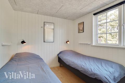 Eines der 9 Schlafzimmer im Luxusferienhaus Nr. 412