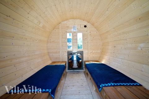 Genießen Sie die heiße Sauna im Luxusferienhaus Nr. 412 für 24 Personen