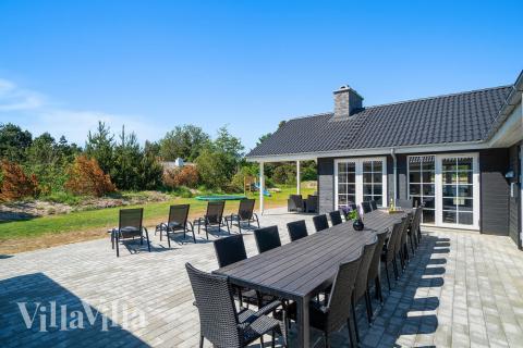 Das Luxusferienhaus Nr. 412 hat eine tolle Terrasse, die mit hochwertigen Gartenmöbeln für 24 Personen ausgestattet ist.