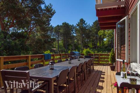 Genießen Sie einen Grillabend auf der Terrasse des Luxusferienhauses Nr. 423 in Ostjütland