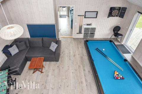 Aktivitätsraum im Luxusferienhaus Nr. 421 mit 6 Schlafzimmern und Platz für 16 Gäste.