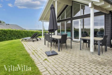 Das Luxusferienhaus Nr. 421 hat eine tolle Terrasse, die mit hochwertigen Gartenmöbeln für 16 Personen ausgestattet ist.