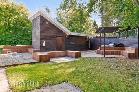 Genießen Sie einen Grillabend auf der Terrasse des Luxusferienhauses Nr. 414 in Nordseeland