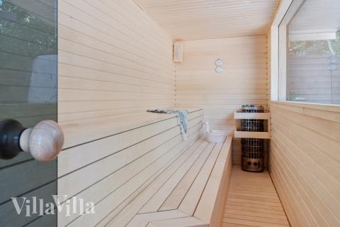 Genießen Sie die heiße Sauna im Luxusferienhaus Nr. 414 für 22 Personen