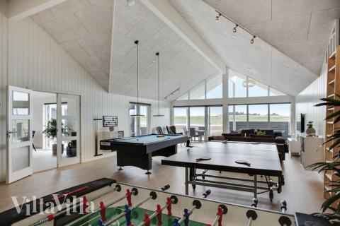 Neben den vielen schönen Stunden, die man im Poolbereich des Hauses verbringen kann, bietet das Luxusferienhaus 430 auch Spielevergnügen bei Billard/Tischtennis und Darts