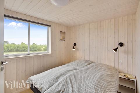 Eines der 12 Schlafzimmer im Luxusferienhaus Nr. 430