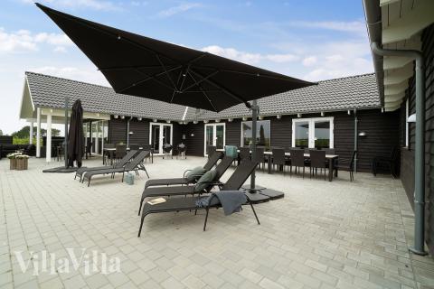 Das Luxusferienhaus Nr. 430 hat eine tolle Terrasse, die mit hochwertigen Gartenmöbeln für 30 Personen ausgestattet ist.