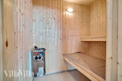 Genießen Sie die heiße Sauna im Luxusferienhaus Nr. 425 für 16 Personen