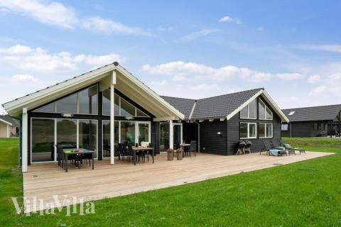 Dieses schöne Poolhaus Nr. 425 mit Platz für 16 Personen liegt in Nordseeland