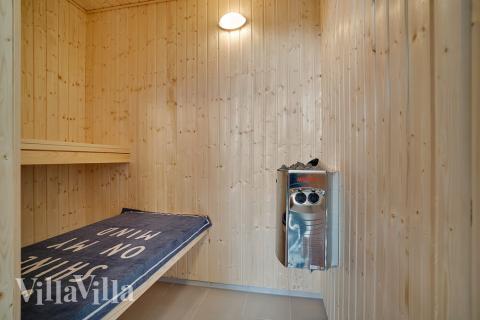 Genießen Sie die heiße Sauna im Luxusferienhaus Nr. 426 für 16 Personen
