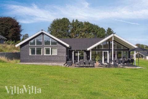 Das Luxusferienhaus Nr. 426 hat eine tolle Terrasse, die mit hochwertigen Gartenmöbeln für 16 Personen ausgestattet ist.