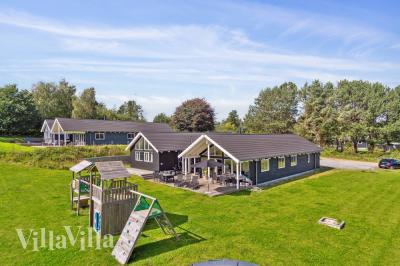 Dieses schöne Poolhaus Nr. 426 mit Platz für 16 Personen liegt in Nordseeland