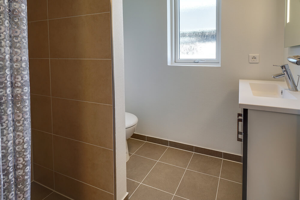 Eines der Badezimmer im Luxusferienhaus Nr. 717