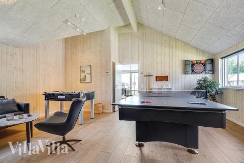 Neben den vielen schönen Stunden, die man im Poolbereich des Hauses verbringen kann, bietet das Luxusferienhaus 717 auch Spielevergnügen bei Billard/Tischtennis und Darts