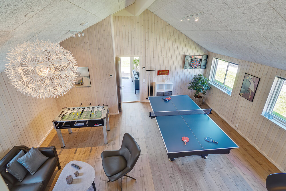 Das Luxusferienhaus 717 für 16 Personen hat einen großen Aktivitätsraum mit u. a. Billard und Darts