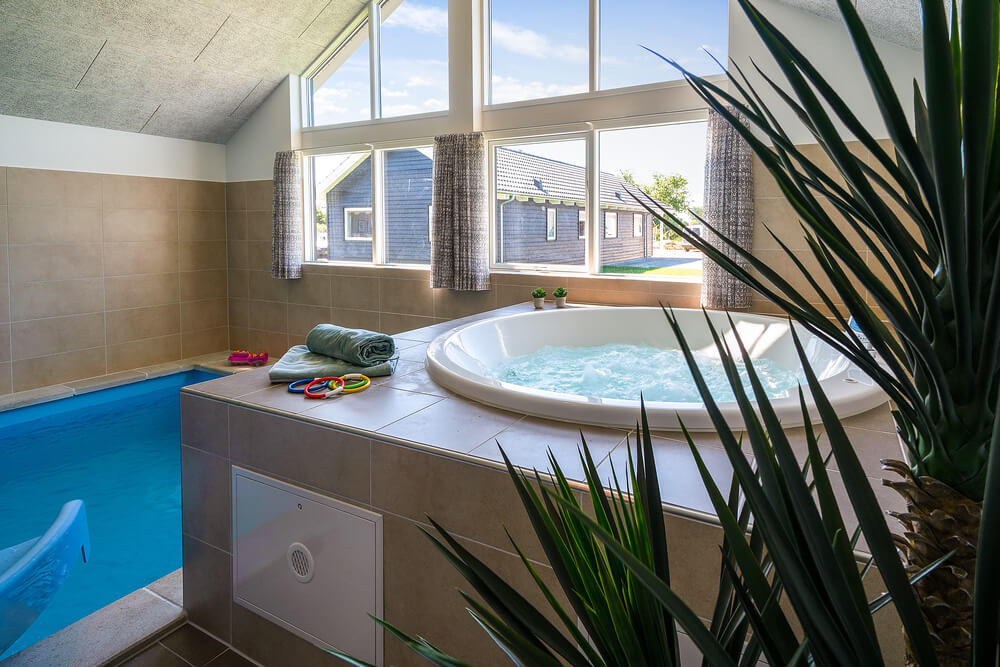 Genießen Sie den warmen Whirlpool im Luxusferienhaus Nr. 717 in Deutschland
