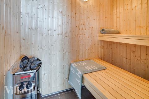Genießen Sie die heiße Sauna im Luxusferienhaus Nr. 717 für 16 Personen