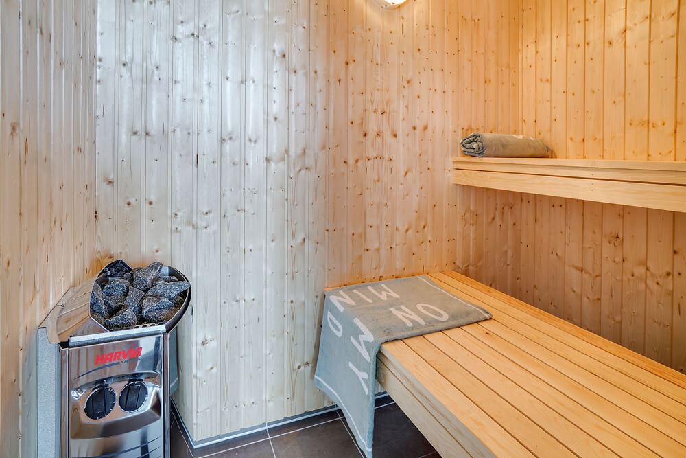 Genießen Sie die heiße Sauna im Luxusferienhaus Nr. 717 für 16 Personen